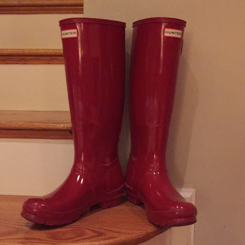 Shiny red tall Hunter boots